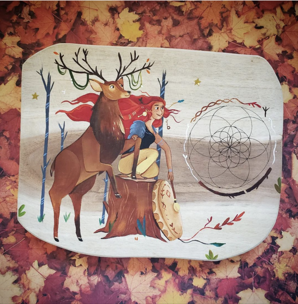 peinture sur bois planche de lithothérapie d'une femme rousse avec un cerf dans la forêt