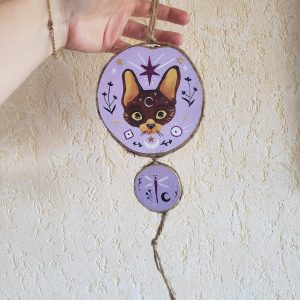 Décoration tête de chat  mystique sur fond lilas