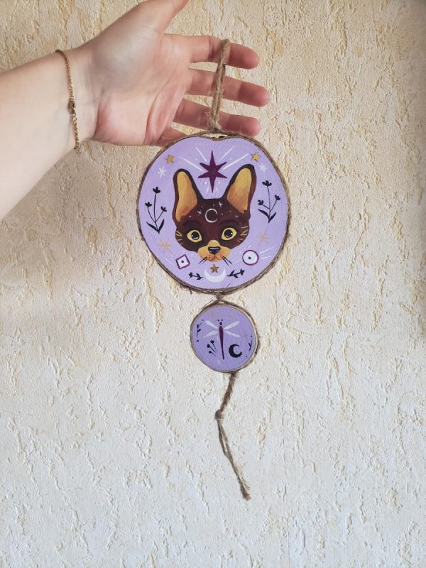 decoration tete de chat sur fond violet